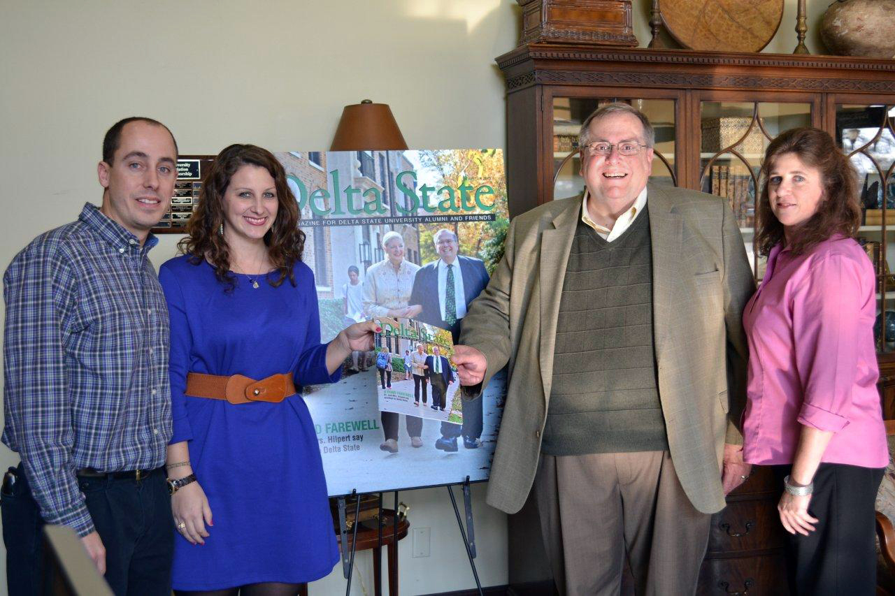 PHOTO: The Alumni staff, Jeffrey Farris, Jordan Thomas, and Cheryl Oleis present Delta State President Dr. John M. Hilpert with the latest copy of the Delta State Alumni Magazine.